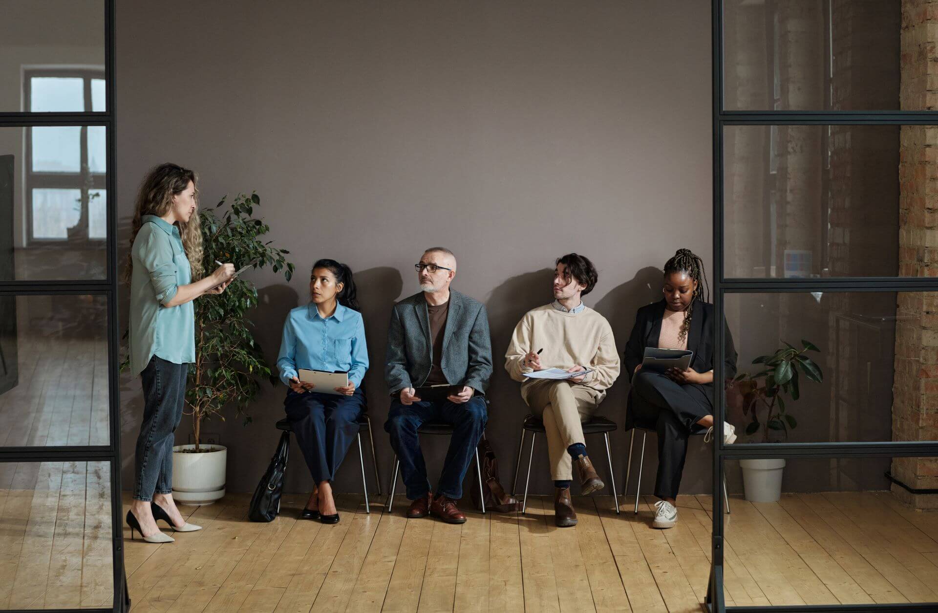 people sitting at employment agency 2022 04 27 01 50 54 utc 1